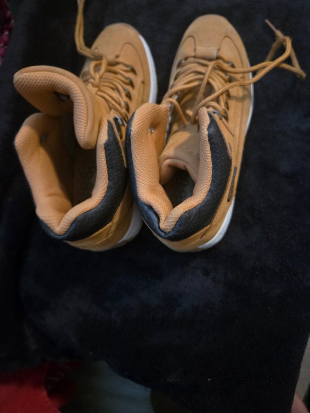 A pair of kids Lugz